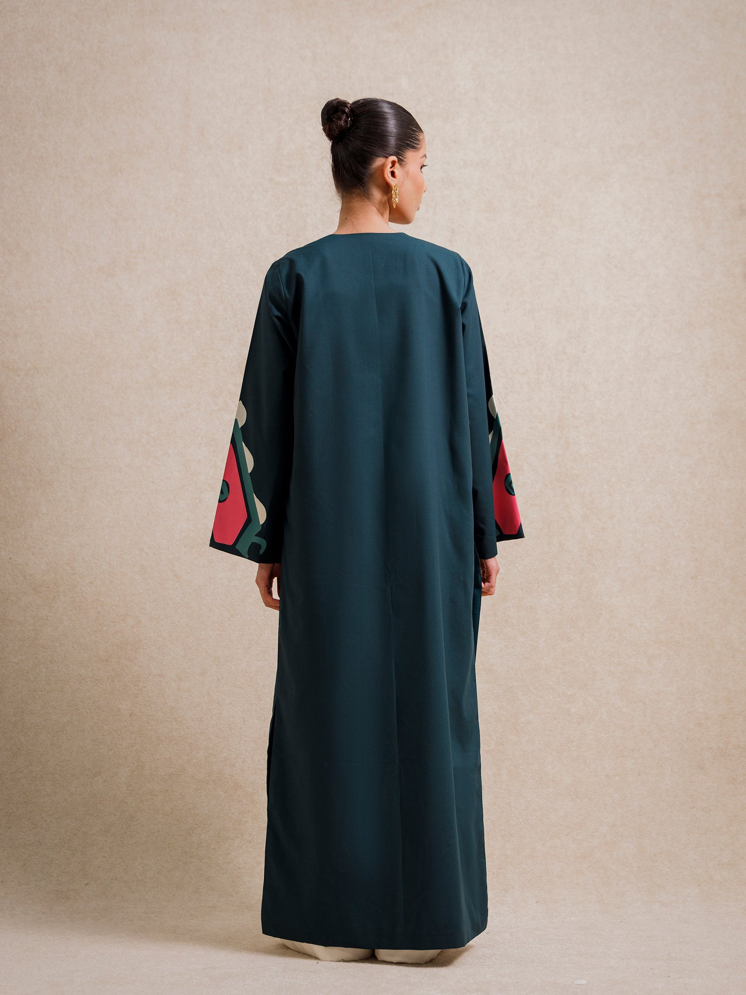 Back view of Jade Fest Green long jacket with clean silhouette