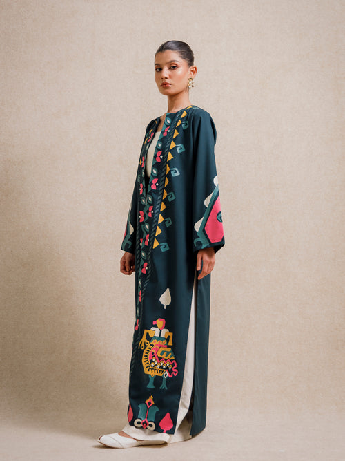 Side view of Jade Fest Green long jacket with hand screen printed motifs