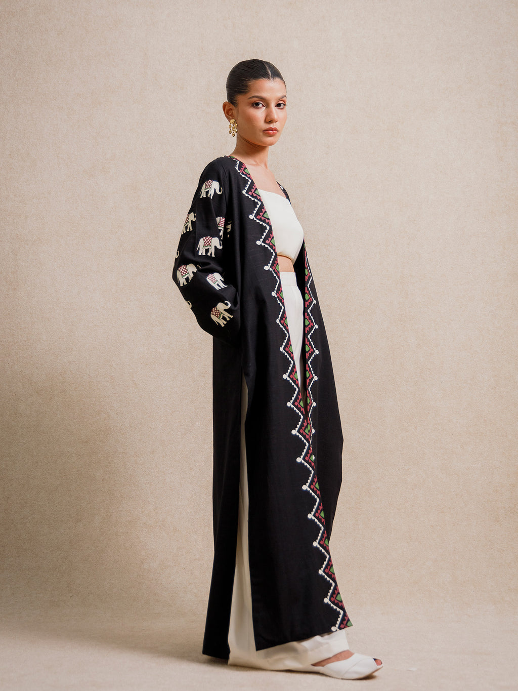 Side view of Indian Black Elephant long kimono with hand screen-printed elephant motifs on sleeves