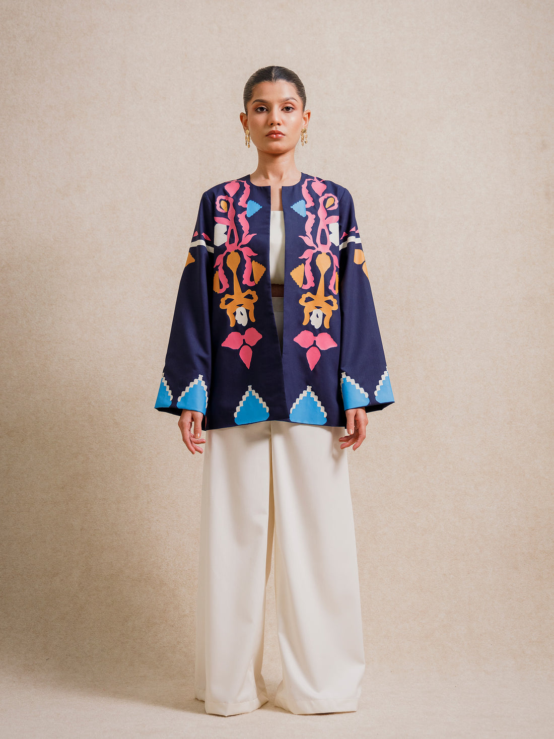 Front view of Medici Dream blue short jacket featuring hand screen-printed motifs inspired by Renaissance art