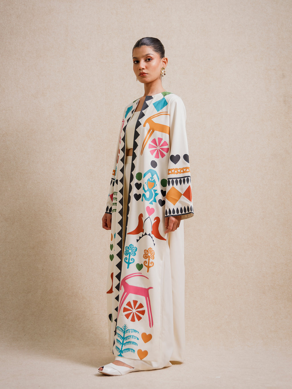 Side view of the Meso Caramel long kimono showcasing its printed panels and elongated silhouette