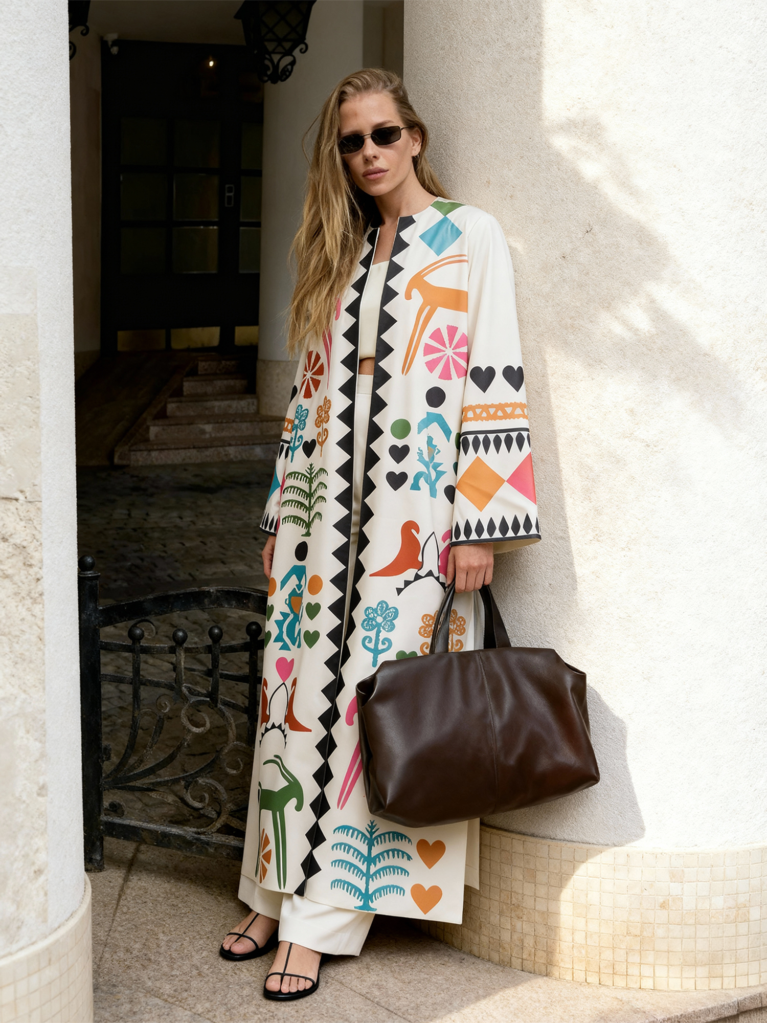 Meso Caramel long kimono styled outdoors, featuring hand-printed motifs and a relaxed, flowing silhouette