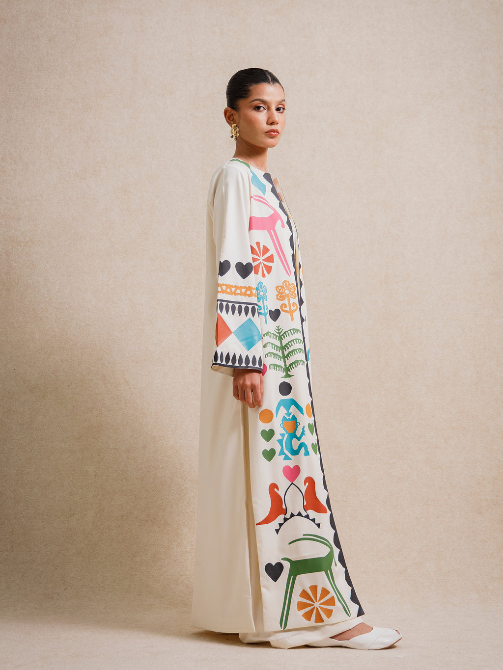 Side view of the Meso Caramel long kimono showcasing its printed panels and elongated silhouette