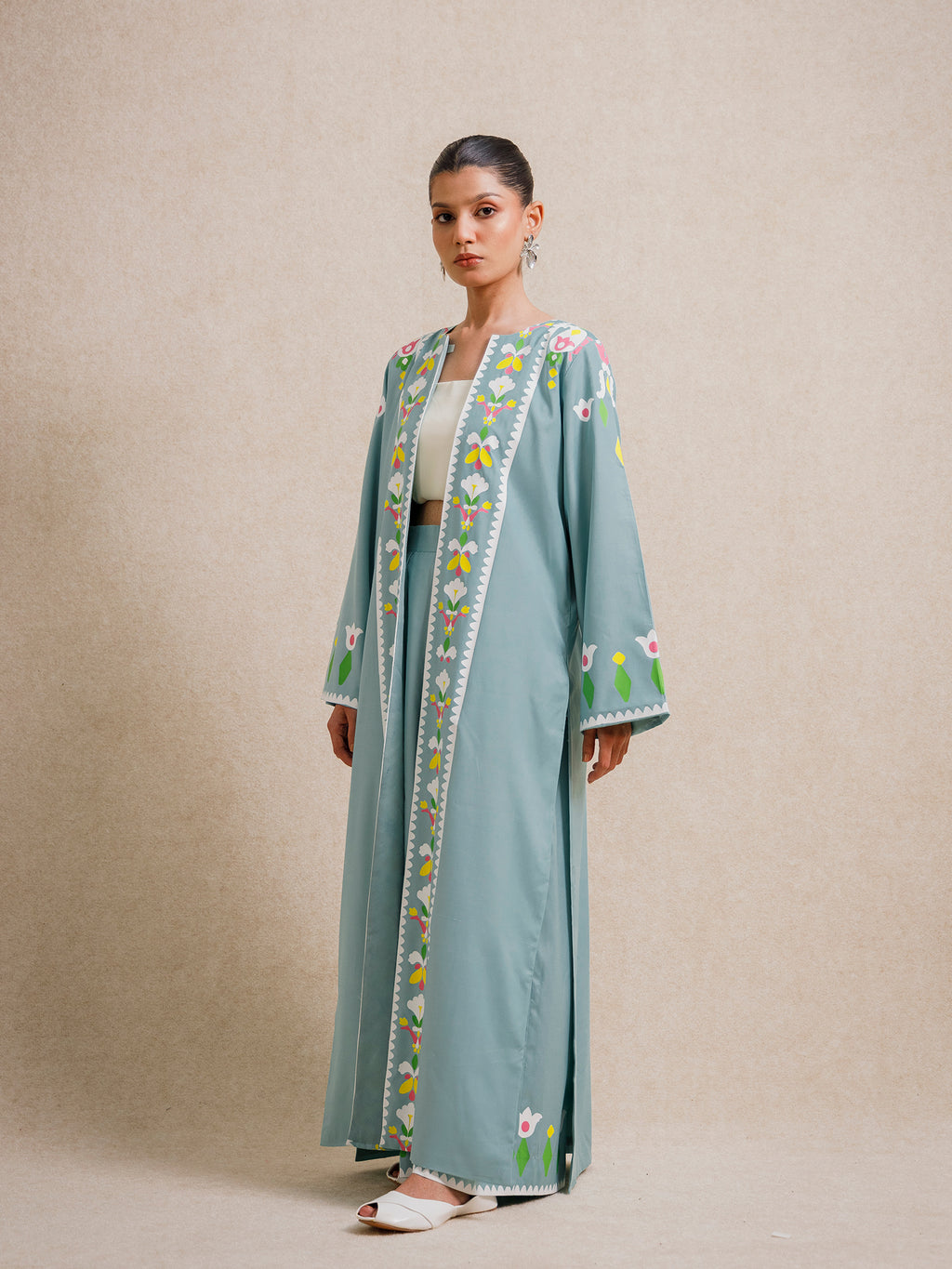 Side view of Tiffany Blue two piece set from the Rooted collection with floral screen-printed detailing