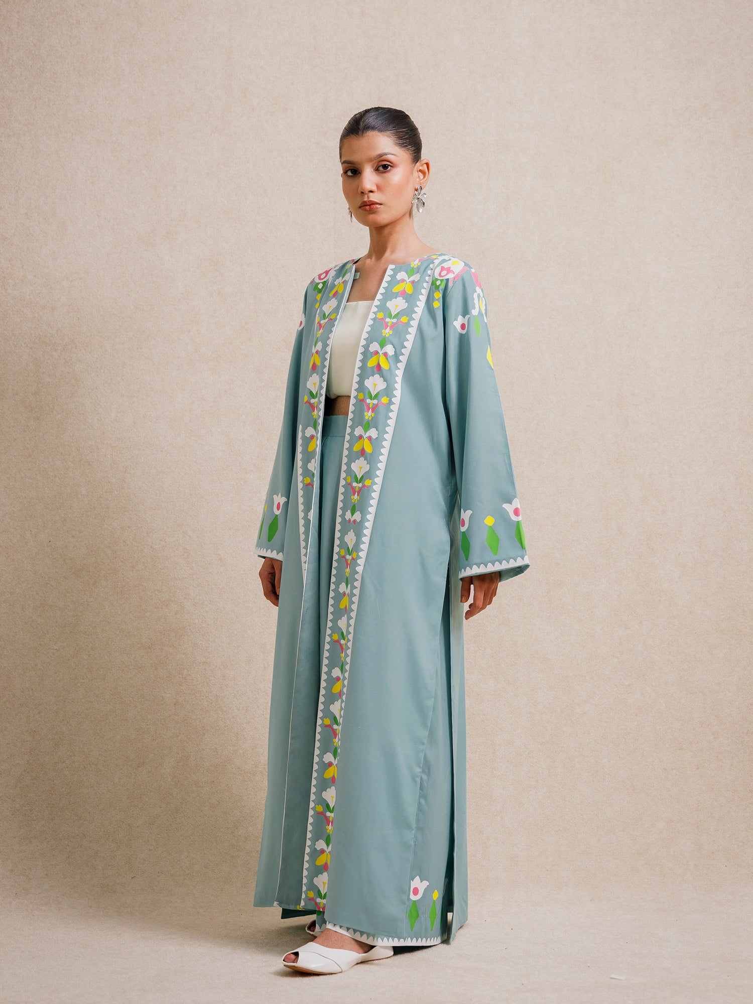 Side view of Tiffany Blue two piece set from the Rooted collection with floral screen-printed detailing