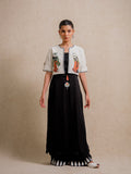 Front view of Eternal Lovers white three piece set featuring hand illustrated figures on a cropped jacket with flowing black skirt
