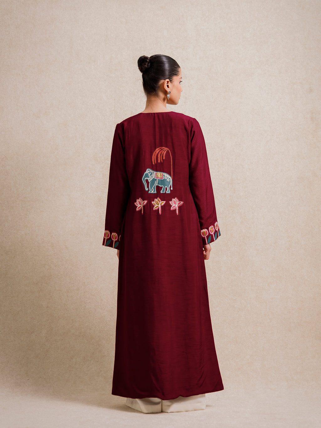 Back view of the Forbidden Love Scarlet long jacket featuring elephant embroidery by Rangdasti